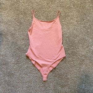 Pink bodysuit